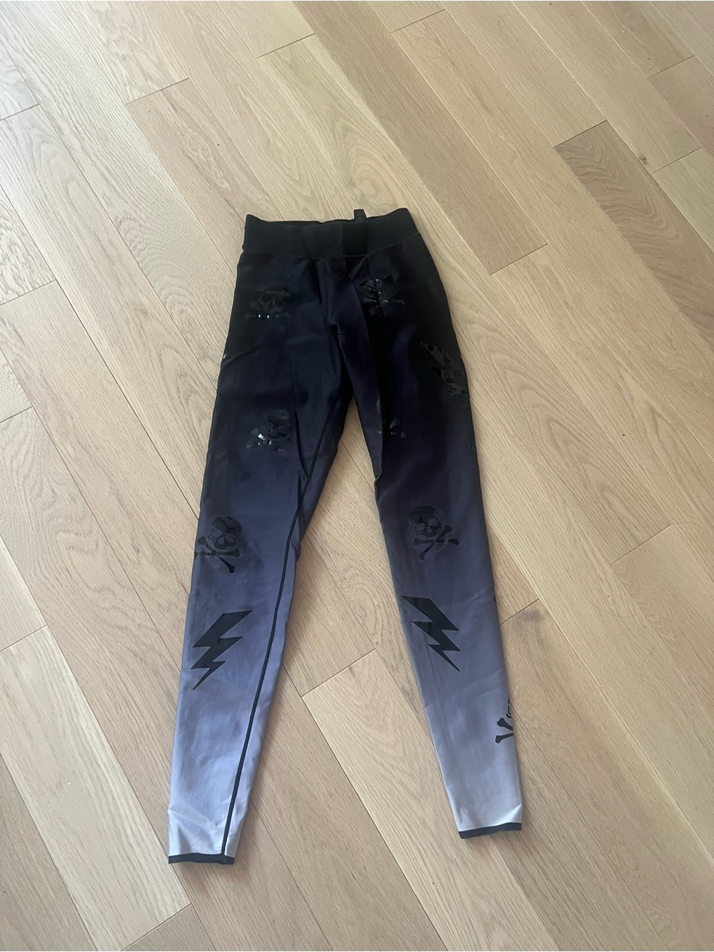 Ultracore Black to Gray Ombre Skull Lightning Leggings